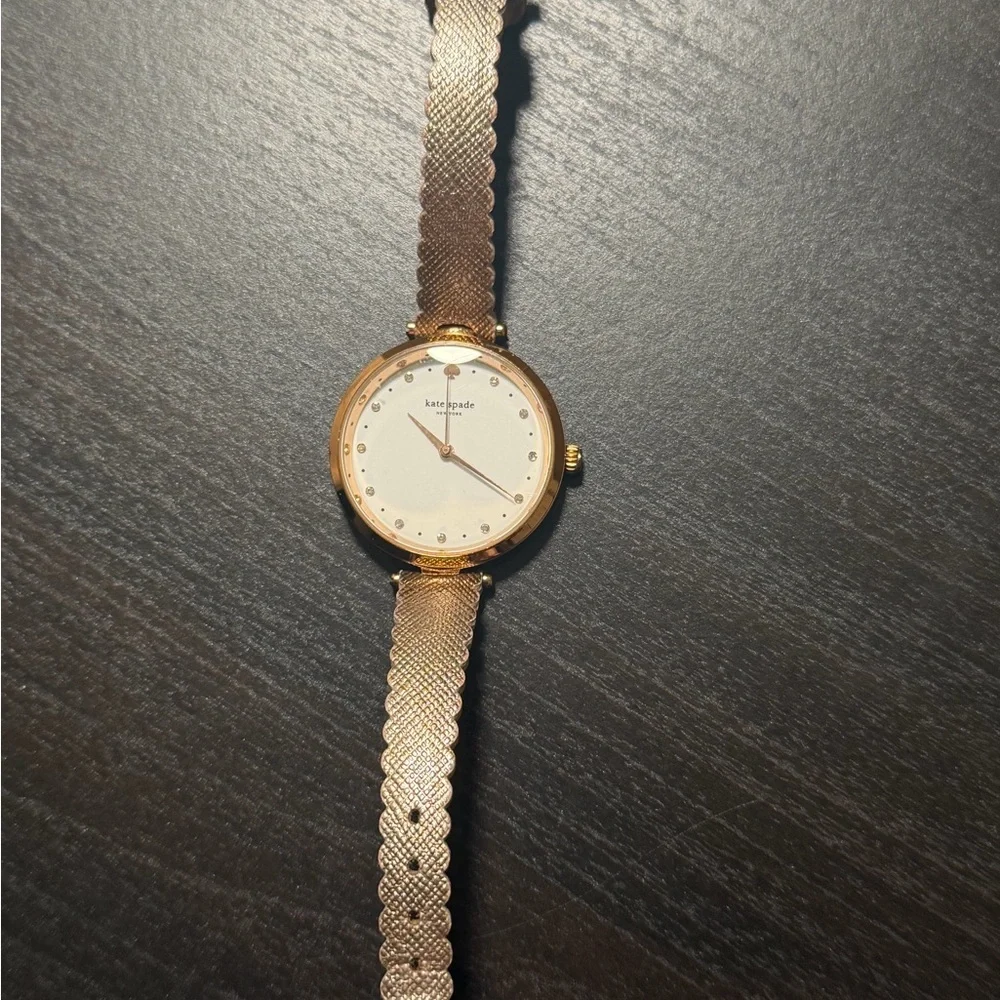 Kate Spade Holland Women's Rose Gold Leather White Dial Watch needs battery